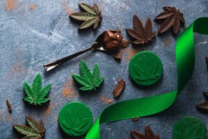 cannabis-infused edible chocolate leaves with spoon